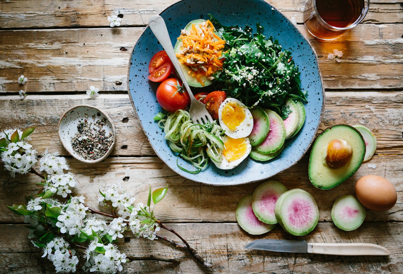 A fresh spread of vegetables, grains and herbs ready to cook